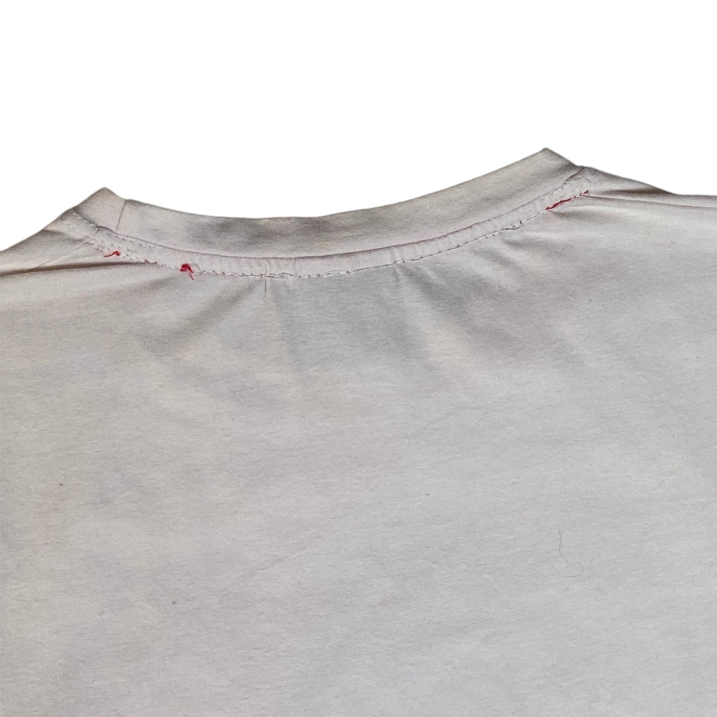 Digg It Thrift & Vintage white Le Temps des Cerises t-shirt featuring red stitching detail at the neckline.