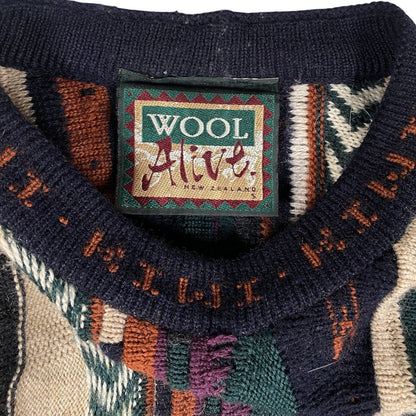 Digg It Thrift & Vintage Wool Alive New Zealand textured knit crewneck sweater with a patterned collar label