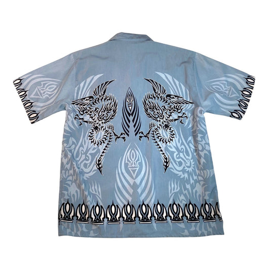 Back view of a Digg It Thrift & Vintage Y2K button-up shirt featuring a light blue dragon and tribal print.