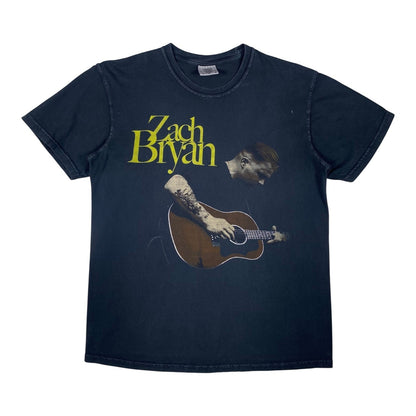 Digg It Thrift & Vintage black cotton t-shirt featuring a graphic print of Zach Bryan playing an acoustic guitar