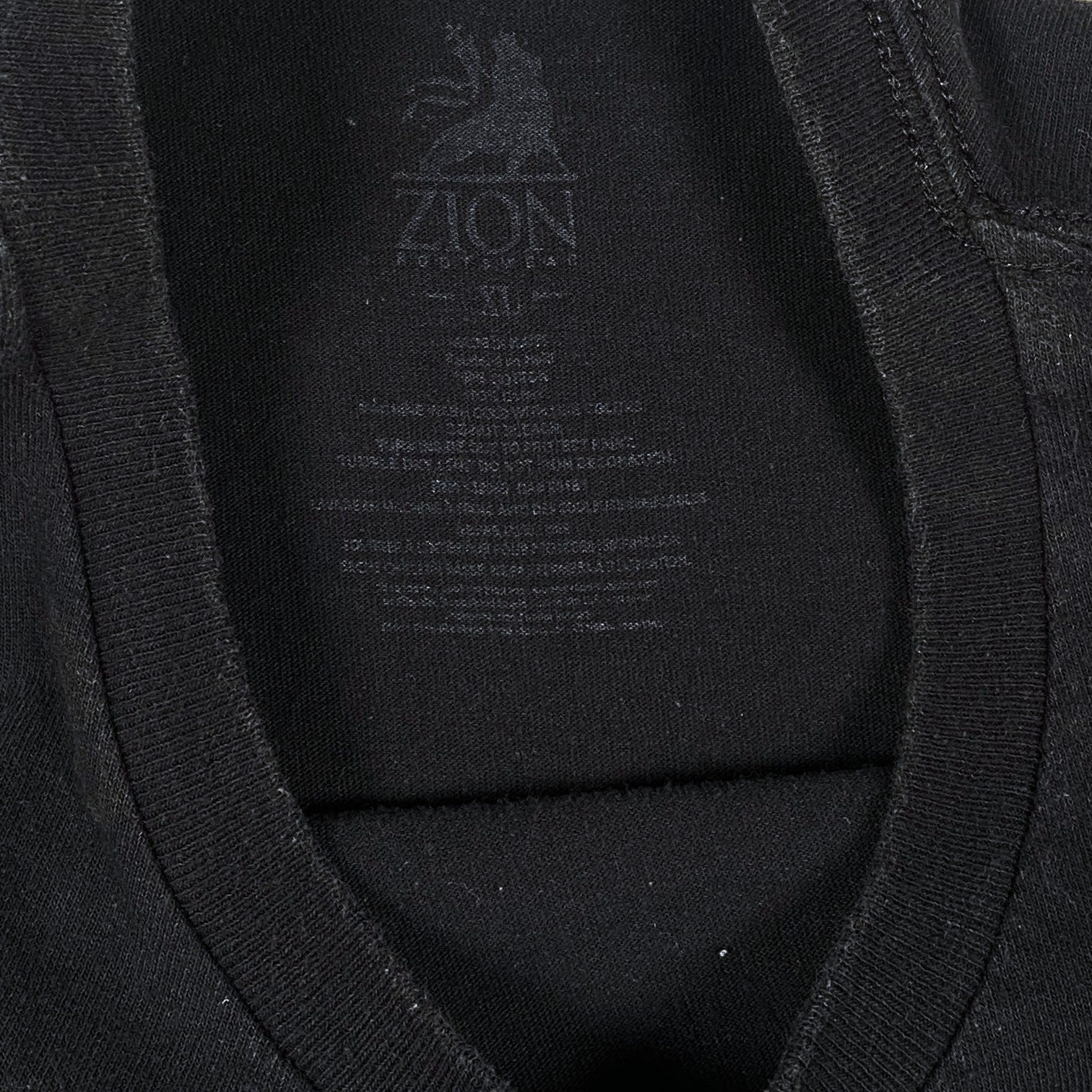 Digg It Thrift & Vintage black Zion Rootswear t-shirt neck label with size XL print